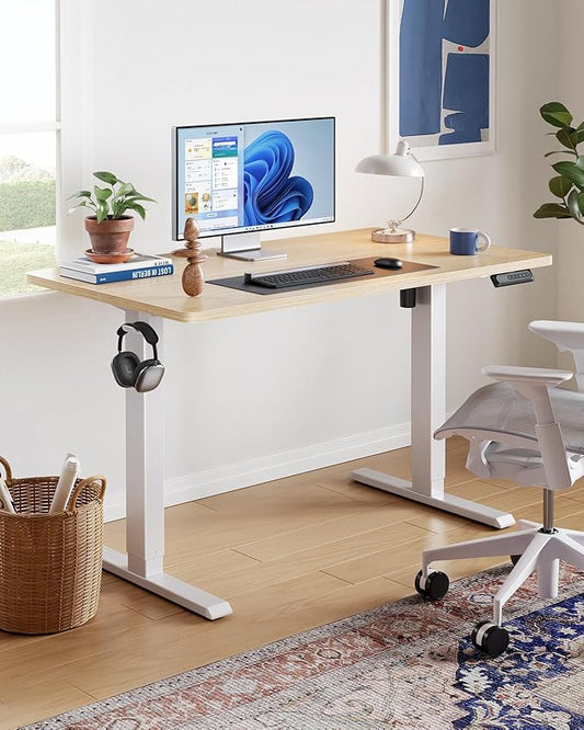 HUANUO 63" x 28" Electric Standing Desk Adjustable Height, 4 Memory Height Settings, Headphone Hook, Cable Manager, Sit Stand Up Desk for Home Office & Computer Workstation, Nature